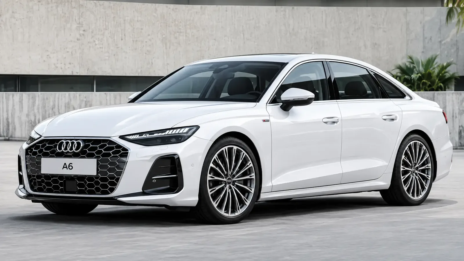 Weißer Audi A6 vor moderner Architektur