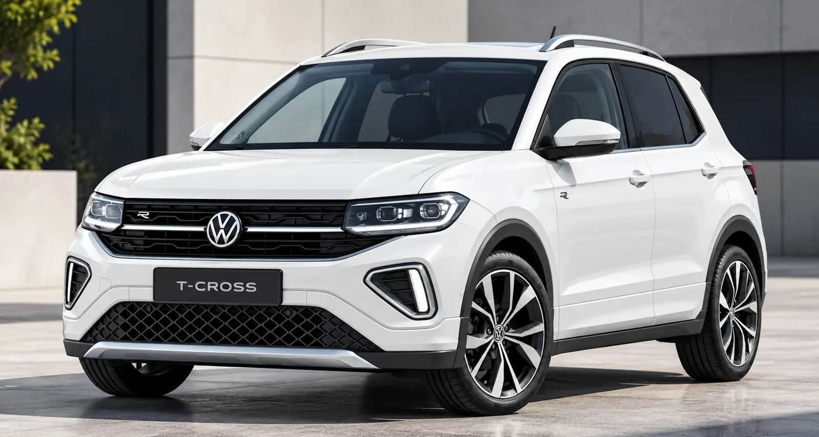 Weißer Volkswagen T-Cross vor moderner Architektur